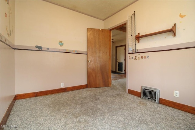 unfurnished room featuring carpet floors