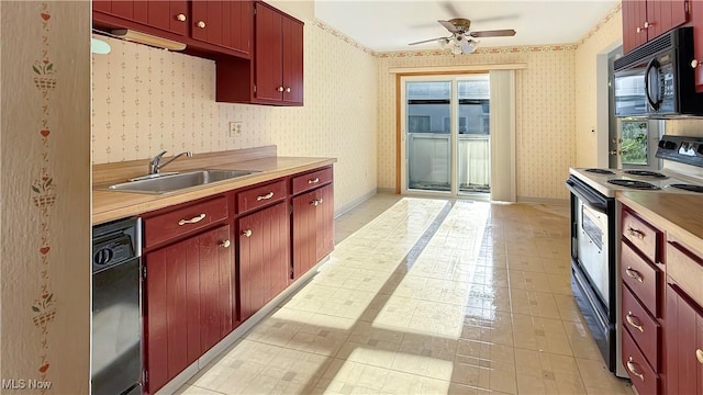 5540 Wrens Ln Unit 26D, Willoughby, OH 44094 - kitchen with black appliances, a sink, wallpapered walls, ceiling fan, and light countertops