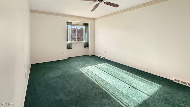 5540 Wrens Ln Unit 26D, Willoughby, OH 44094 - spare room featuring dark carpet, a ceiling fan, and baseboards