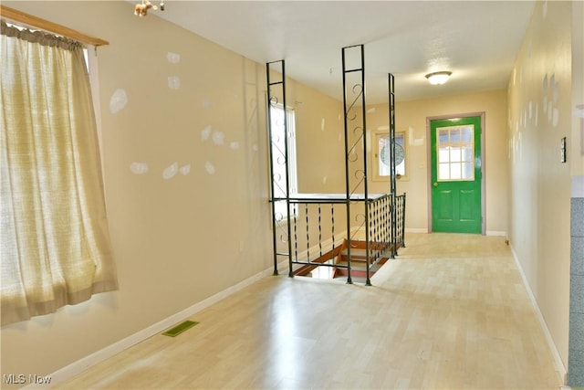 foyer entrance featuring light hardwood / wood-style flooring