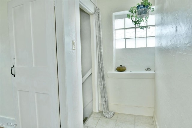 bathroom featuring tile patterned floors