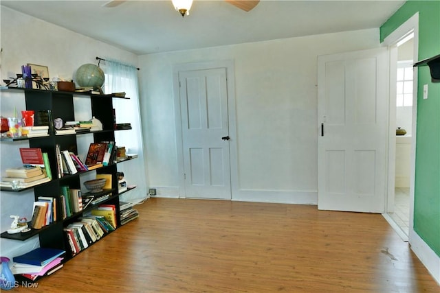 interior space featuring ceiling fan and hardwood / wood-style floors