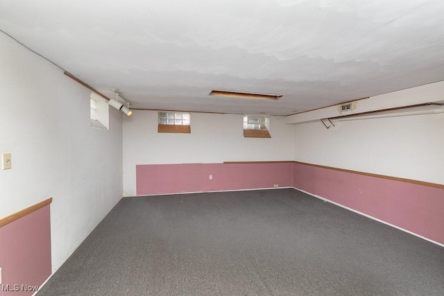 basement with carpet flooring