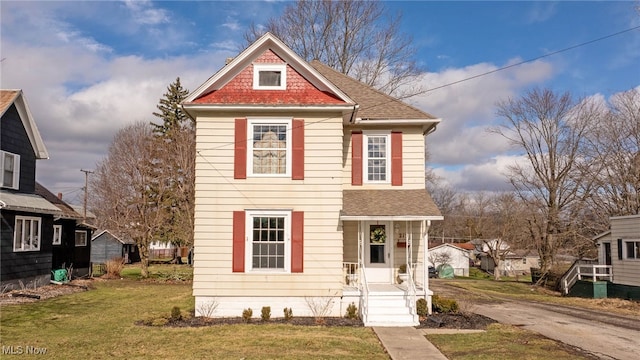 view of front facade with a front lawn