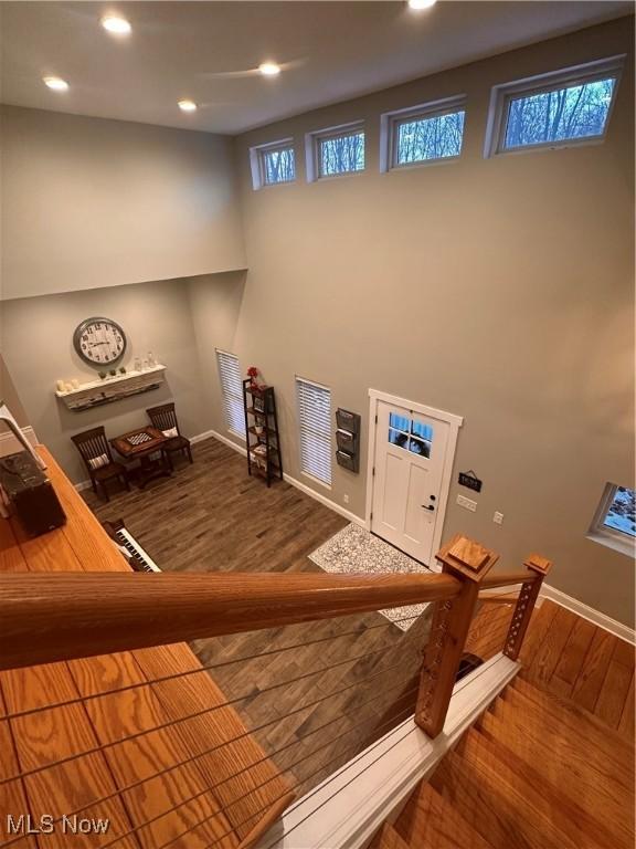 laundry room with hardwood / wood-style flooring