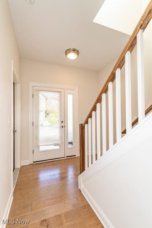 entrance foyer with light hardwood / wood-style floors