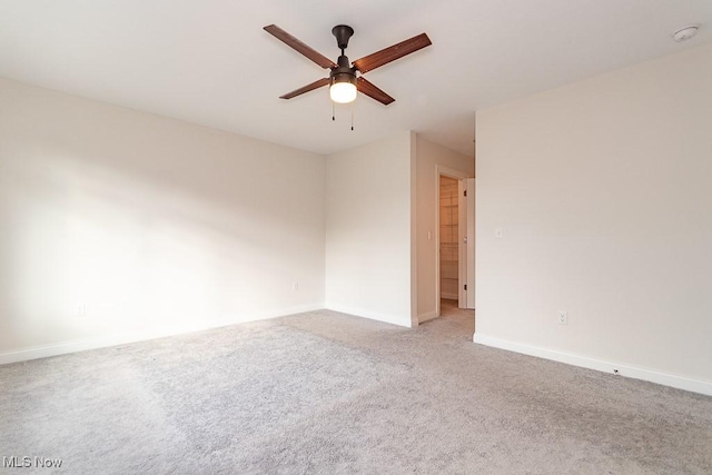 unfurnished room featuring carpet floors and ceiling fan