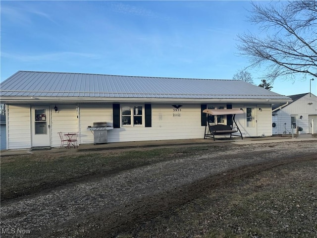 view of front of house featuring metal roof