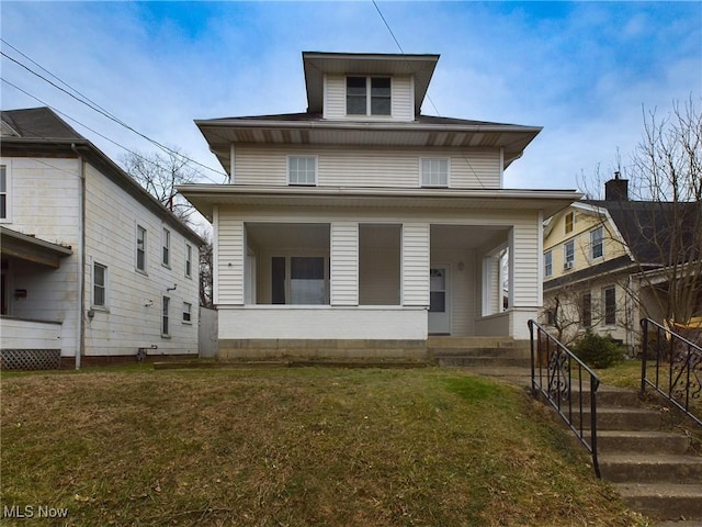 view of front facade with a front yard