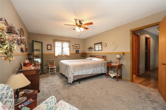 carpeted bedroom featuring a ceiling fan