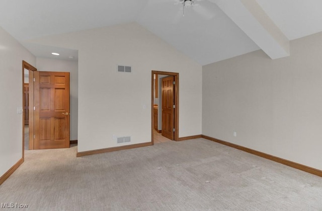 interior space with ceiling fan and vaulted ceiling with beams