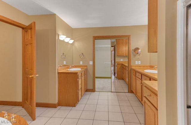 bathroom with vanity and tile patterned floors