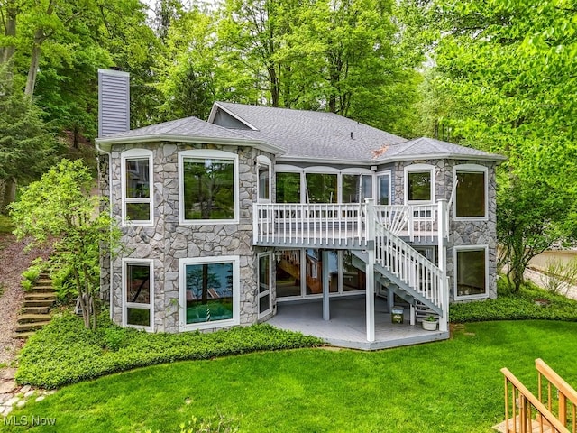 466 W Mohawk Dr, Malvern, OH 44644 - rear view of property featuring stone siding, stairs, and a deck