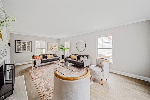 living room with crown molding and hardwood / wood-style flooring