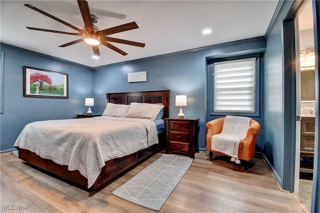 bedroom featuring ceiling fan, ornamental molding, and light hardwood / wood-style floors