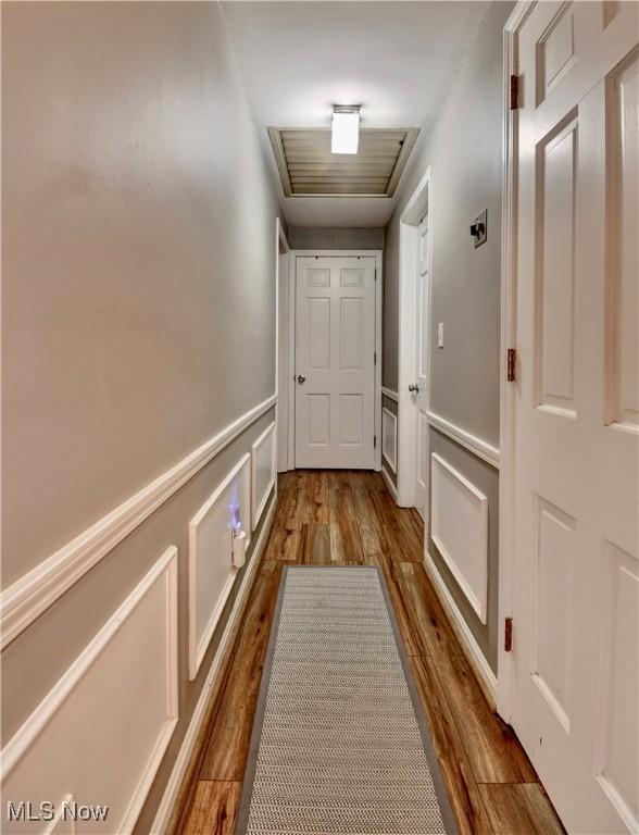 hallway featuring dark hardwood / wood-style floors