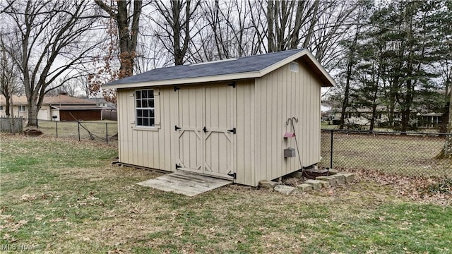 view of outdoor structure with a lawn