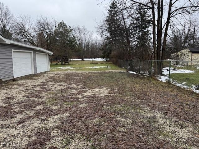 view of yard with a garage