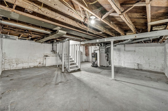 basement with gas water heater and heating unit