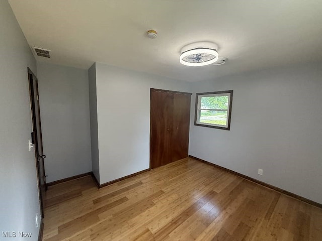 950 Donmar Ln, Boardman, OH 44511 - unfurnished bedroom featuring a closet and light wood-type flooring