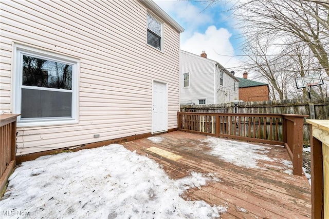 view of snow covered deck