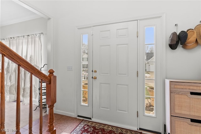 view of tiled foyer entrance