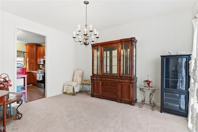 interior space with a notable chandelier and light colored carpet