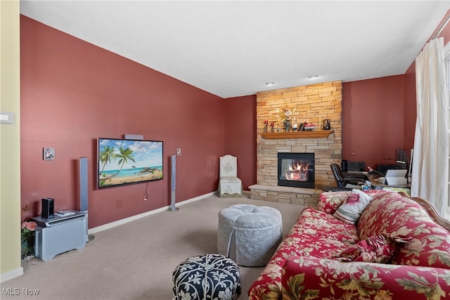 living room featuring carpet flooring and a fireplace