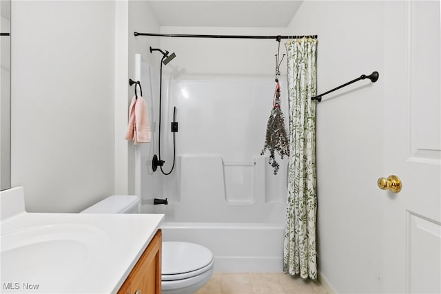 full bathroom featuring shower / bath combination with curtain, tile patterned floors, toilet, and vanity