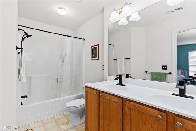 full bathroom featuring vanity, toilet, and shower / bath combo with shower curtain