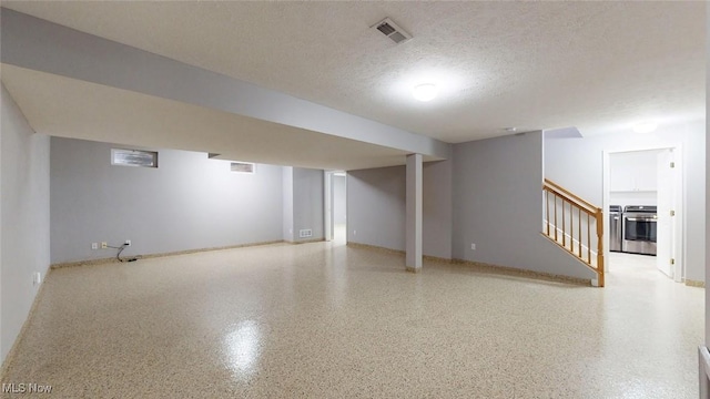 basement with a textured ceiling