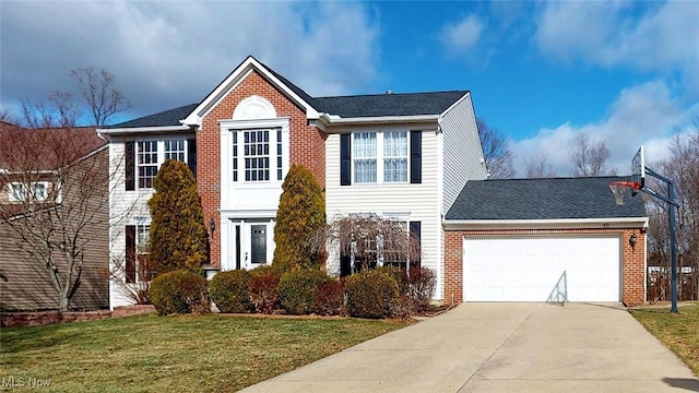 view of front of home featuring a garage and a front yard