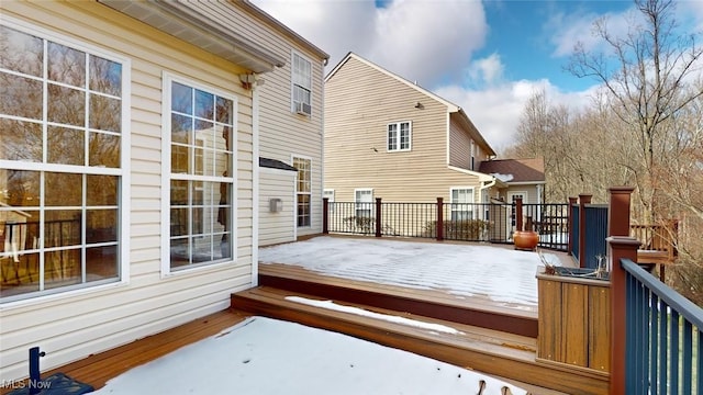 view of snow covered deck