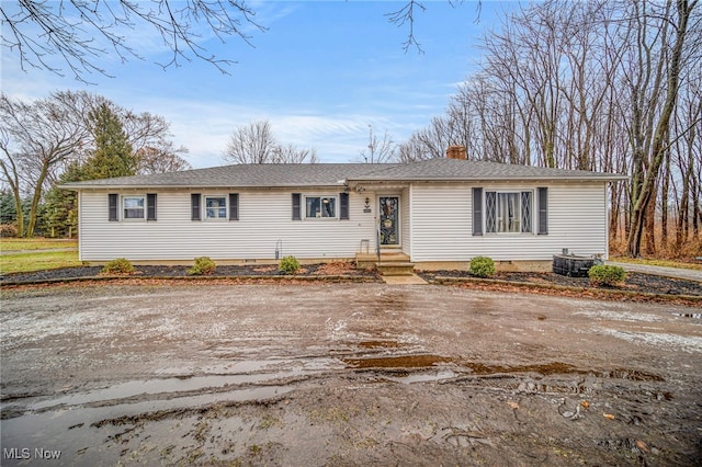 view of front of home featuring central AC unit