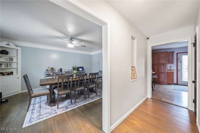 dining room featuring hardwood / wood-style floors and ceiling fan