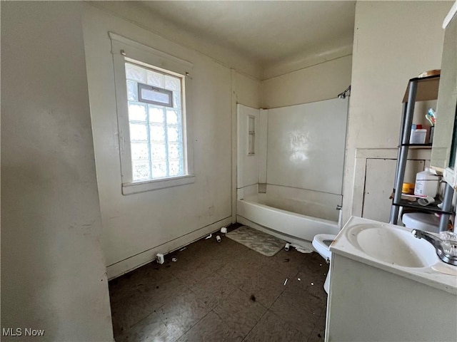 full bathroom with vanity, shower / bathtub combination, and toilet