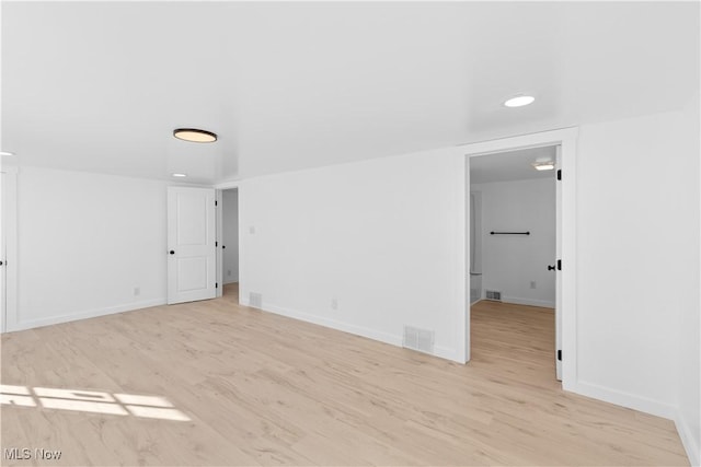 unfurnished room featuring light hardwood / wood-style flooring