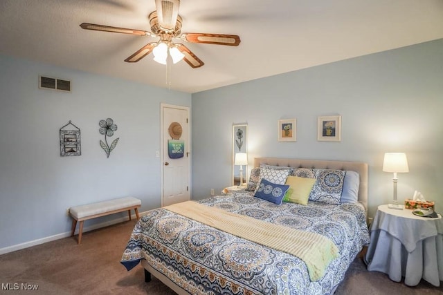 bedroom with ceiling fan and carpet