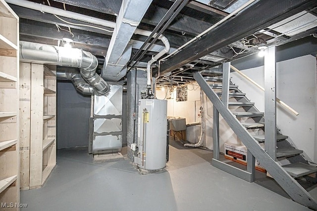 basement featuring heating unit and water heater