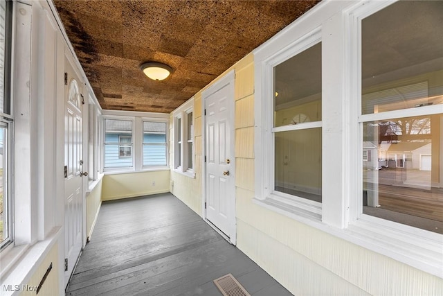 view of unfurnished sunroom