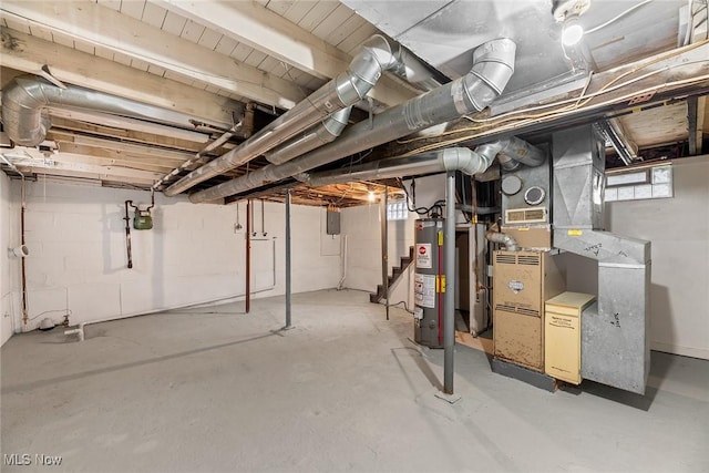 basement with gas water heater and plenty of natural light