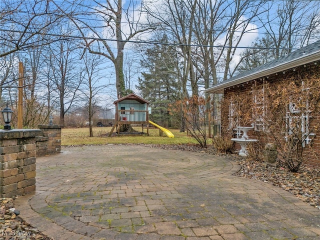 view of patio / terrace featuring a playground