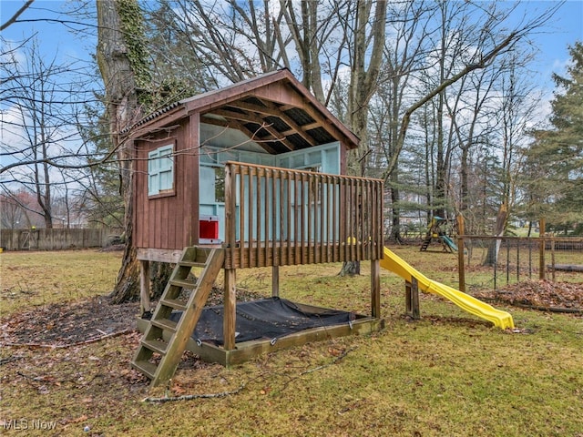 view of jungle gym featuring a yard