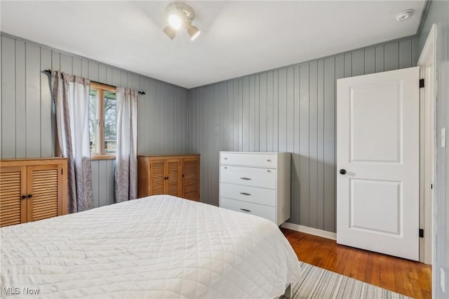 bedroom featuring wood-type flooring