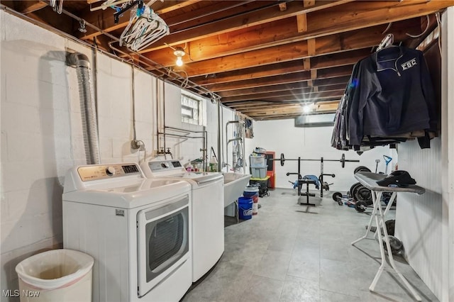 laundry room with sink and washer and dryer