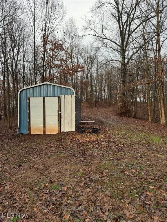 view of outbuilding featuring a garage