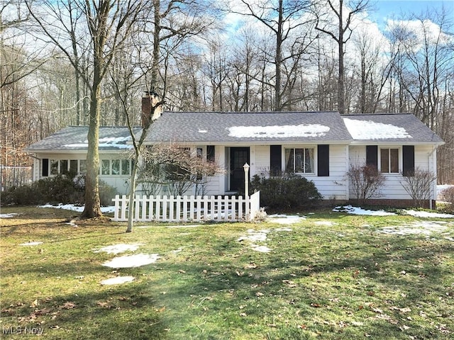 ranch-style house with a front yard