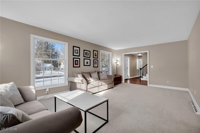 living room featuring carpet flooring