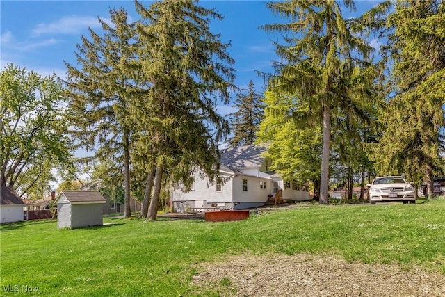 24512 Emery Rd, Warrensville Heights, OH 44128 - view of yard featuring a storage shed