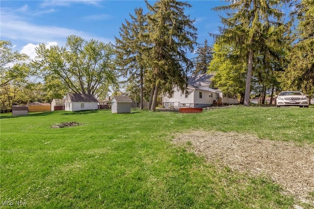 24512 Emery Rd, Warrensville Heights, OH 44128 - view of yard with a storage shed